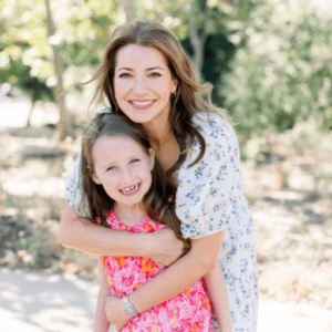 Francesca and her daughter smile for a photo