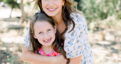 Francesca and her daughter smile for a photo